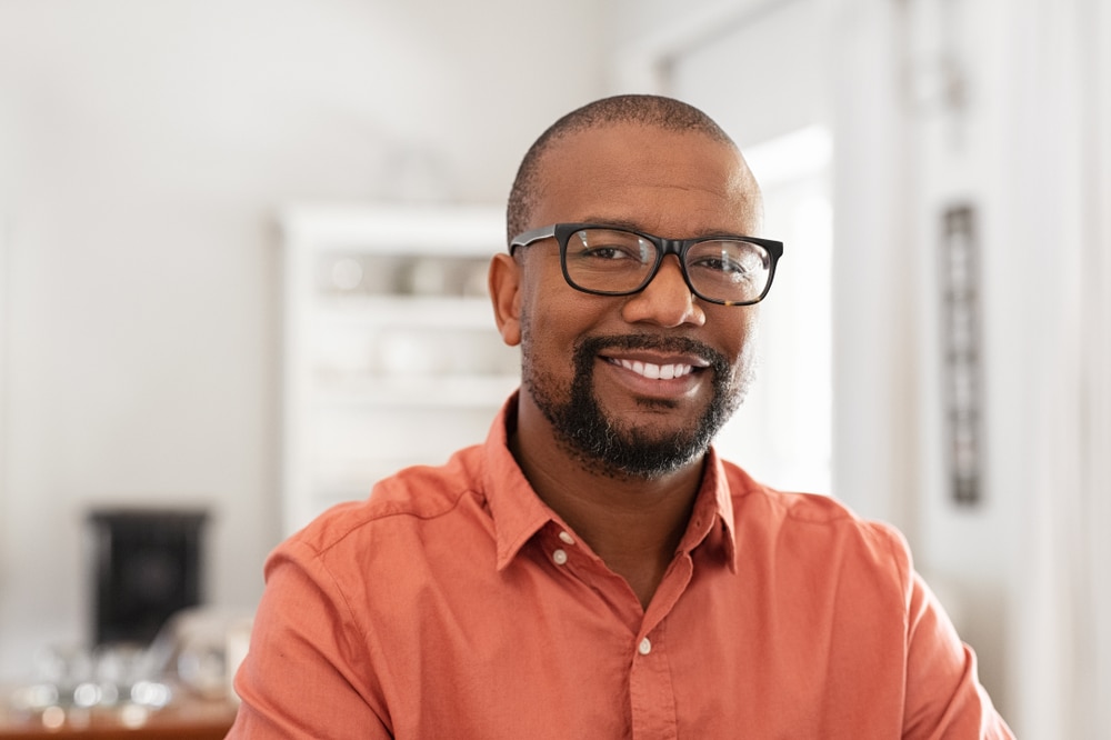 A man keeps his smile healthy and strong with Preventative Dentistry at All Valley Dental